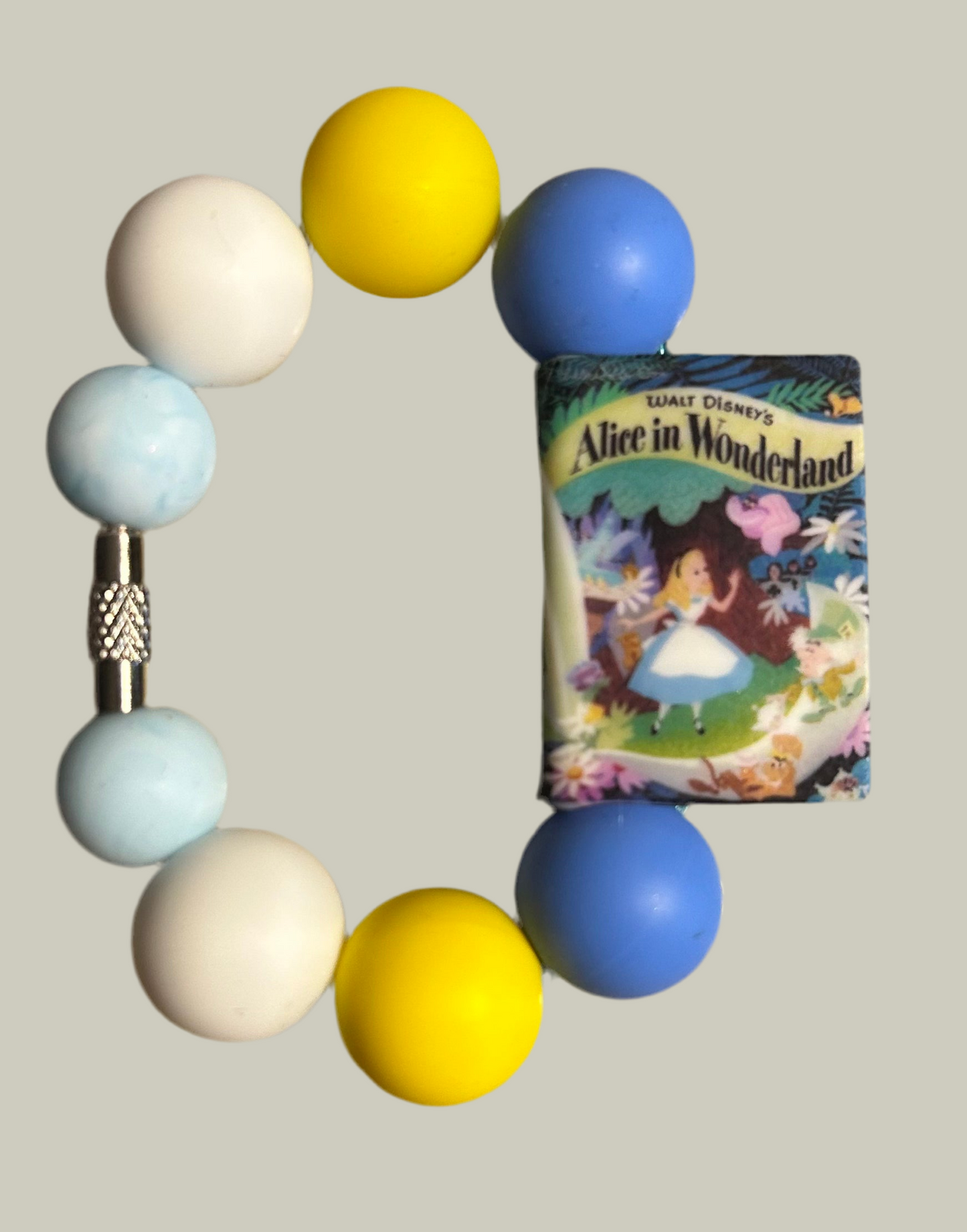 Alice Handle Charm
